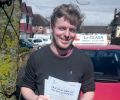  Daniel with Driving test pass certificate